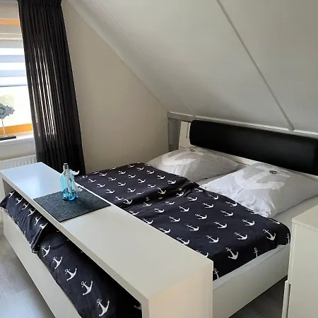 Perle Am Ijsselmeer Mit Eigenem Tretboot Hébergement de vacances